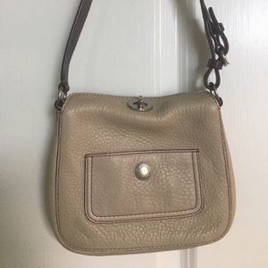 Tan Coach handbag w/purple stitching & interior